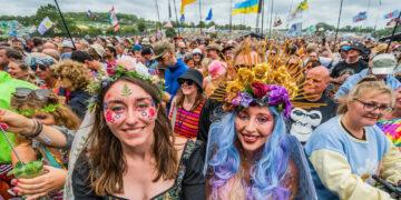 ‘It’s everyone coming back together’: why 200,000 of us couldn’t wait to get back to Glastonbury