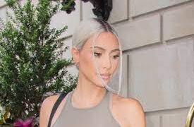 Kim Kardashian Matches Her Silver Hair to Her Outfit With Oversized Camo Pants and Silver Boots With Kids in New York